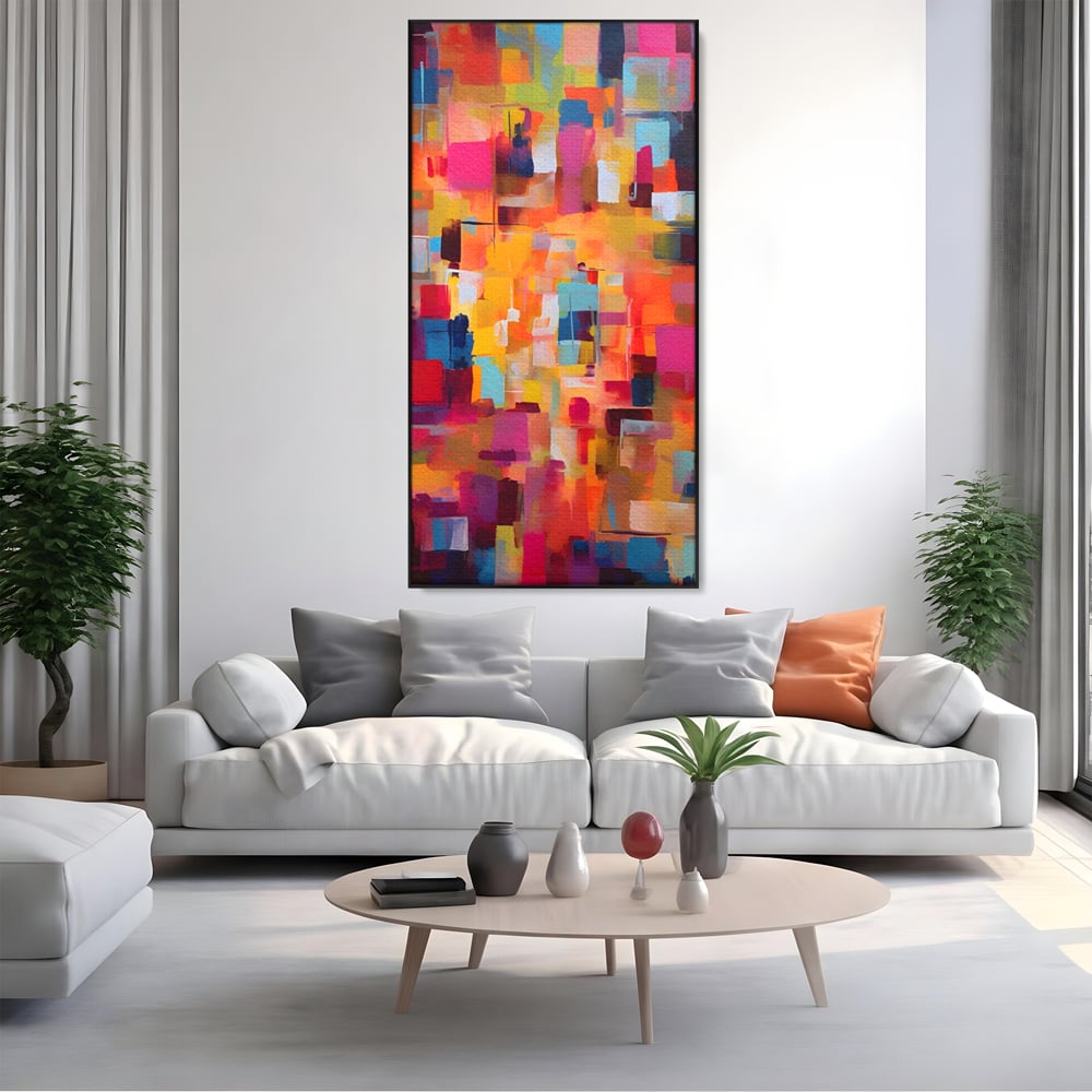 Tablou canvas cu pictura abstracta cu blocuri de culoare, in rama de aluminiu negru, pe perete intr-un living
